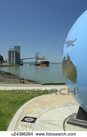Tacoma, WA, Washington, Puget Sound, Commencement Bay, Tacoma Harbor, sculpture of the globe at Thea's Park, grain elevator, freighter View Large Photo Image Picture - Tacoma, WA, Washington, Puget Sound, Commencement Bay, Tacoma Harbor, sculpture of the globe at Thea's Park, grain elevator, freighter. Fotosearch