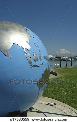 Stock Photo -  Tacoma, WA, Washington, Puget Sound, Commencement Bay, Tacoma Harbor, sculpture of the globe at Thea's Park. Fotosearch