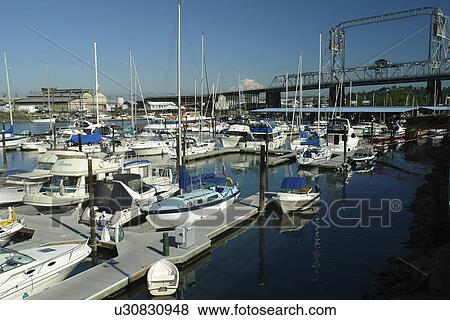 Stock Photo -  Tacoma, WA, Washington, Puget Sound, Commencement Bay, Tacoma Harbor, Murray Morgan Bridge, Mount Rainier. Fotosearch