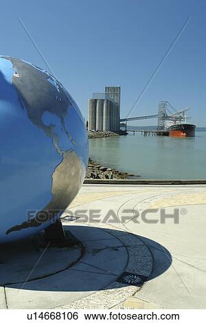 Tacoma, WA, Washington, Puget Sound, Commencement Bay, Tacoma Harbor, sculpture of the globe at Thea's Park, grain elevator, freighter View Large Photo Image Stock Photograph - Tacoma, WA, Washington, Puget Sound, Commencement Bay, Tacoma Harbor, sculpture of the globe at Thea's Park, grain elevator, freighter. Fotosearch
