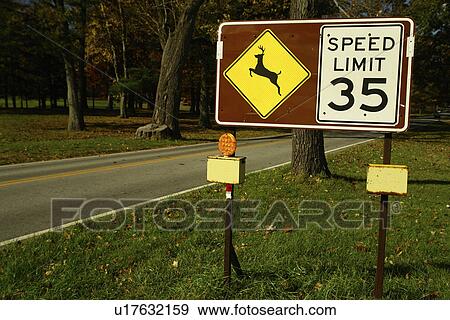 Stock Photo -  Valley Forge National Historic Park, PA, Pennsylvania, Deer Crossing Sign, Speed Limit 35, road sign. Fotosearch