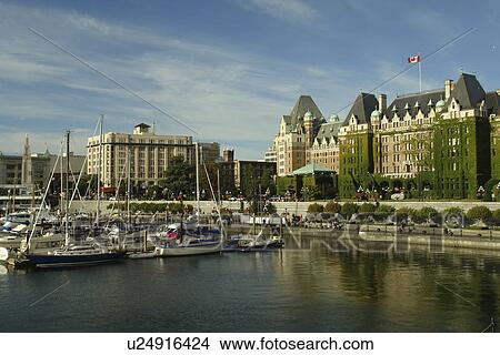 Picture -  Victoria, British Columbia, Canada, Vancouver Island, Inner Harbour, The Empress Hotel, waterfront. Fotosearch