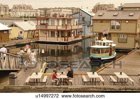 Stock Image -  Victoria, British Columbia, Canada, Vancouver Island, Inner Harbour, Fisherman's Wharf, water taxi. Fotosearch