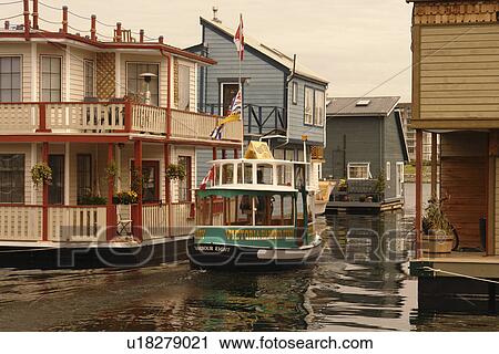 Stock Image -  Victoria, British Columbia, Canada, Vancouver Island, Inner Harbour, Fisherman's Wharf, water taxi. Fotosearch