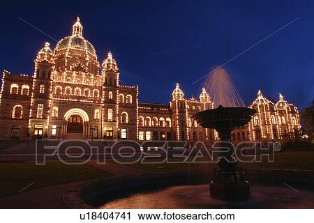 Stock Image -  Victoria, British Columbia, Canada, Vancouver Island, Inner Harbour, Parliament Buildings, evening. Fotosearch