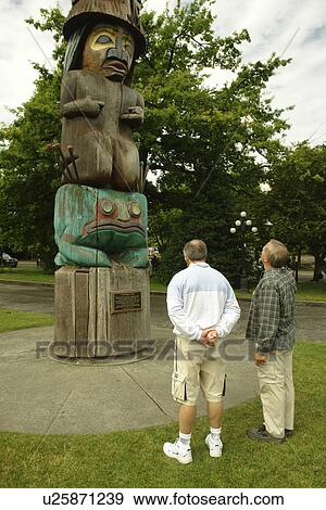 Stock Photo -  Victoria, British Columbia, Canada, Vancouver Island, Thunderbird Park, Knowledge Totem pole. Fotosearch