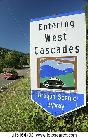Stock Image -  Willamette National Forest, OR, Oregon, Cascade Range, Entering West Cascades Scenic Byway, road sign. Fotosearch