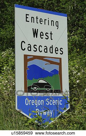 Stock Photo -  Willamette National Forest, OR, Oregon, Cascade Range, Entering West Cascades Scenic Byway, road sign. Fotosearch
