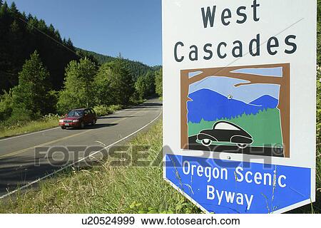 Stock Photo -  Willamette National Forest, OR, Oregon, Cascade Range, Entering West Cascades Scenic Byway, road sign. Fotosearch