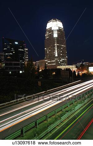 Stock Photo -  Winston-Salem, NC, North Carolina, Downtown, Skyline, evening, expressway. Fotosearch