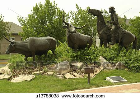 Stock Photo -  Billings, MT, Montana, It's Billings, Chamber of Commerce, Convention and Visitor Bureau, Cattle Drive Monument. Fotosearch