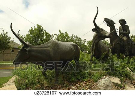 Stock Photo -  Billings, MT, Montana, It's Billings, Chamber of Commerce, Convention and Visitor Bureau, Cattle Drive Monument. Fotosearch