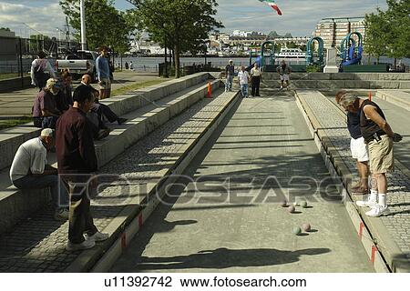 Boston, MA, Massachusetts, men playing a game of bocce in park View Large Photo Image Stock Image - Boston, MA, Massachusetts, men playing a game of bocce in park. Fotosearch