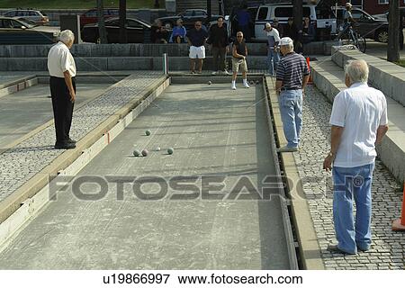 Boston, MA, Massachusetts, men playing a game of bocce in park View Large Photo Image Stock Photo - Boston, MA, Massachusetts, men playing a game of bocce in park. Fotosearch