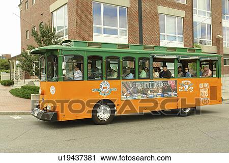 Stock Image -  Boston, MA, Massachusetts, Old Town Trolley Tours, Shuttle bus, tour bus. Fotosearch