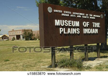 Stock Image -  Browning, MT, Montana, Rocky Mountains, Blackfeet Indian Reservation, Museum of the Plains Indian, sign. Fotosearch
