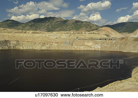 Stock Image -  Butte, MT, Montana, Berkeley Pit, old open pit mine. Fotosearch