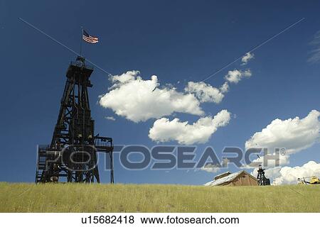 Butte, MT, Montana, Berkeley Pit, old open pit mine, mine shaft, mine headframe View Large Photo Image Stock Photo - Butte, MT, Montana, Berkeley Pit, old open pit mine, mine shaft, mine headframe. Fotosearch