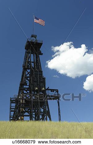 Stock Photo -  Butte, MT, Montana, Berkeley Pit, old open pit mine, mine shaft, mine headframe. Fotosearch