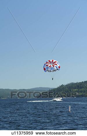 Coeur D' Alene, ID, Idaho, Coeur D' Alene Resort, Lake Coeur D' Alene, parasail boat View Large Photo Image Stock Photo - Coeur D' Alene, ID, Idaho, Coeur D' Alene Resort, Lake Coeur D' Alene, parasail boat. Fotosearch