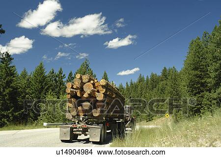 Picture -  Colville Indian Reservation, WA, Washington, Logging Truck, road. Fotosearch