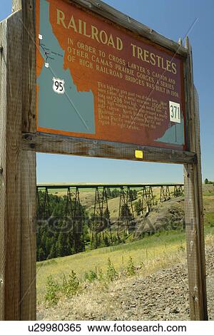 Stock Photography -  Cottonwood, ID, Idaho, Camas Prairie, Railroad on Stilts, trestles, some of world's tallest, interpretive sign, historical marker. Fotosearch