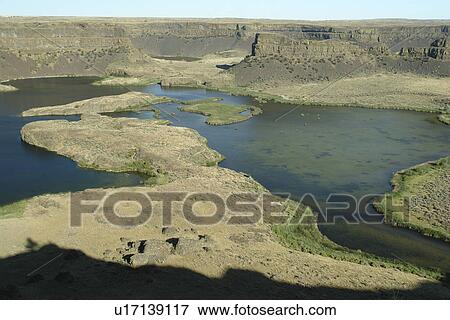 Stock Photo -  Coulee City, WA, Washington, Grand Coulee, Sun Lakes State Park, Dry Falls. Fotosearch