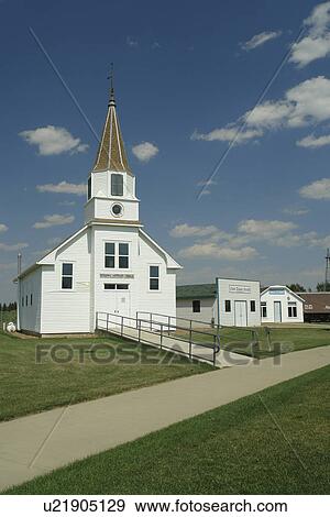 Stock Photo -  Dickinson, ND, North Dakota, Pioneer Machinery Museum and Pioneer Village, Ridgeway Lutheran Church. Fotosearch