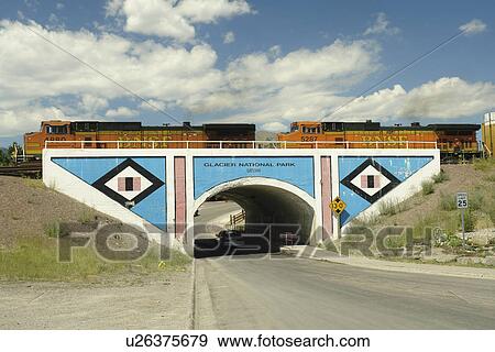 East Glacier Park, MT, Montana, Rocky Mountains, Blackfeet Indian Reservation, railroad bridge View Large Photo Image Stock Photo - East Glacier Park, MT, Montana, Rocky Mountains, Blackfeet Indian Reservation, railroad bridge. Fotosearch