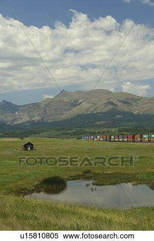 East Glacier Park, MT, Montana, Rocky Mountains, Blackfeet Indian Reservation, freight train View Large Photo Image Stock Photography - East Glacier Park, MT, Montana, Rocky Mountains, Blackfeet Indian Reservation, freight train. Fotosearch