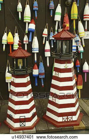 Stock Image -  Ellsworth, ME, Maine, gift shop, lobster fishing buoys, lighthouses. Fotosearch