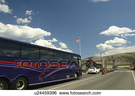 Gardiner, MT, Montana, Yellowstone National Park, North Entrance, gate, tour bus View Large Photo Image Stock Photograph - Gardiner, MT, Montana, Yellowstone National Park, North Entrance, gate, tour bus. Fotosearch