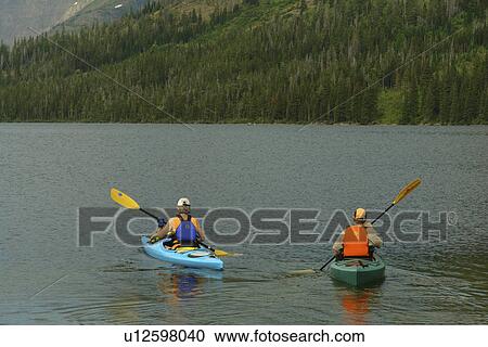 Glacier National Park, MT, Montana, Rocky Mountains, Two Medicine Lake, kayaking View Large Photo Image Stock Image - Glacier National Park, MT, Montana, Rocky Mountains, Two Medicine Lake, kayaking. Fotosearch