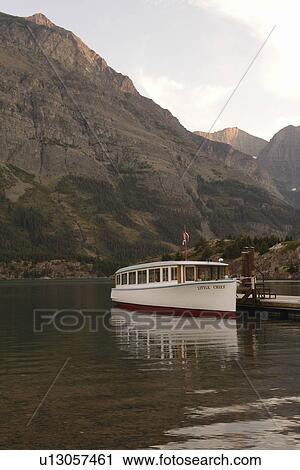 Glacier National Park, MT, Montana, Rocky Mountains, Going to the Sun Road, St. Mary Lake, Rising Sun Boat Landing, excursion boat View Large Photo Image Stock Image - Glacier National Park, MT, Montana, Rocky Mountains, Going to the Sun Road, St. Mary Lake, Rising Sun Boat Landing, excursion boat. Fotosearch