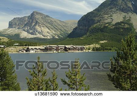 Glacier National Park, MT, Montana, Rocky Mountains, Many Glacier Region, Many Glacier Hotel, Swiftcurrent Lake View Large Photo Image Stock Image - Glacier National Park, MT, Montana, Rocky Mountains, Many Glacier Region, Many Glacier Hotel, Swiftcurrent Lake. Fotosearch