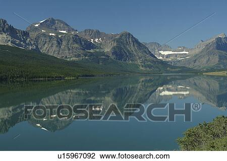 Glacier National Park, MT, Montana, Rocky Mountains, Many Glacier Region, Lake Sherburne View Large Photo Image Stock Image - Glacier National Park, MT, Montana, Rocky Mountains, Many Glacier Region, Lake Sherburne. Fotosearch