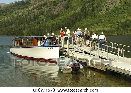 Glacier National Park, MT, Montana, Rocky Mountains, Two Medicine Lake, excursion boat View Large Photo Image Stock Image - Glacier National Park, MT, Montana, Rocky Mountains, Two Medicine Lake, excursion boat. Fotosearch