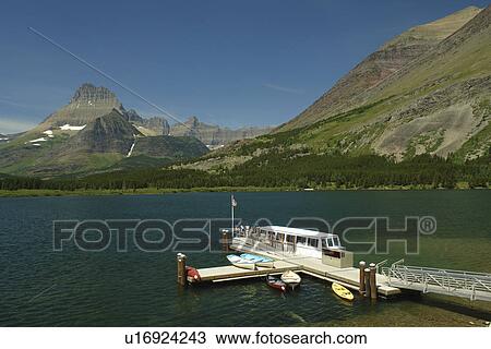 Glacier National Park, MT, Montana, Rocky Mountains, Many Glacier Region, Many Glacier Hotel, Swiftcurrent Lake View Large Photo Image Stock Image - Glacier National Park, MT, Montana, Rocky Mountains, Many Glacier Region, Many Glacier Hotel, Swiftcurrent Lake. Fotosearch