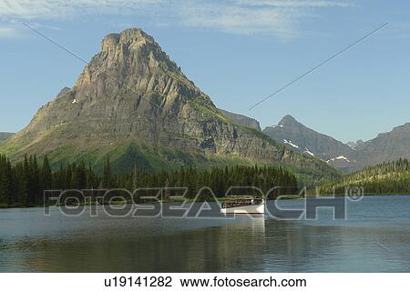 Glacier National Park, MT, Montana, Rocky Mountains, Two Medicine Lake, excursion boat View Large Photo Image Stock Image - Glacier National Park, MT, Montana, Rocky Mountains, Two Medicine Lake, excursion boat. Fotosearch