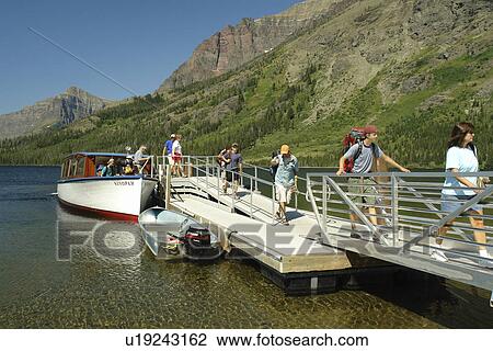 Glacier National Park, MT, Montana, Rocky Mountains, Two Medicine Lake, excursion boat View Large Photo Image Stock Image - Glacier National Park, MT, Montana, Rocky Mountains, Two Medicine Lake, excursion boat. Fotosearch
