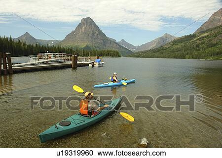 Glacier National Park, MT, Montana, Rocky Mountains, Two Medicine Lake, kayaking View Large Photo Image Stock Image - Glacier National Park, MT, Montana, Rocky Mountains, Two Medicine Lake, kayaking. Fotosearch