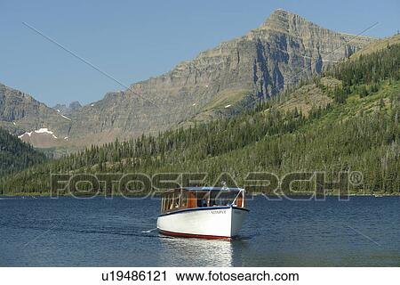 Glacier National Park, MT, Montana, Rocky Mountains, Two Medicine Lake, excursion boat View Large Photo Image Stock Image - Glacier National Park, MT, Montana, Rocky Mountains, Two Medicine Lake, excursion boat. Fotosearch