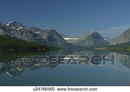 Glacier National Park, MT, Montana, Rocky Mountains, Many Glacier Region, Lake Sherburne View Large Photo Image Stock Image - Glacier National Park, MT, Montana, Rocky Mountains, Many Glacier Region, Lake Sherburne. Fotosearch