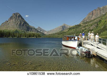 Glacier National Park, MT, Montana, Rocky Mountains, Two Medicine Lake, excursion boat View Large Photo Image Stock Photo - Glacier National Park, MT, Montana, Rocky Mountains, Two Medicine Lake, excursion boat. Fotosearch