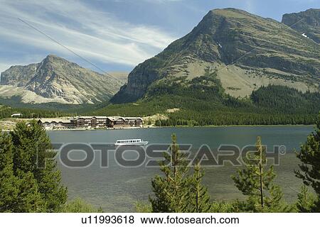 Glacier National Park, MT, Montana, Rocky Mountains, Many Glacier Region, Many Glacier Hotel, Swiftcurrent lake View Large Photo Image Stock Photo - Glacier National Park, MT, Montana, Rocky Mountains, Many Glacier Region, Many Glacier Hotel, Swiftcurrent lake. Fotosearch