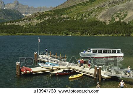 Stock Photo -  Glacier National Park, MT, Montana, Rocky Mountains, Many Glacier Region, Many Glacier Hotel, Swiftcurrent Lake. Fotosearch