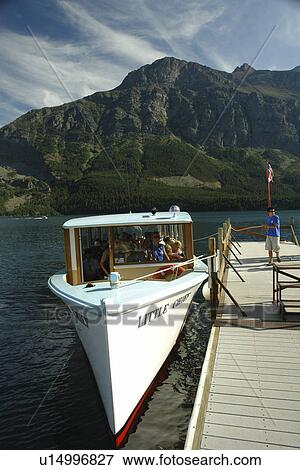 Glacier National Park, MT, Montana, Rocky Mountains, Going to the Sun Road, St. Mary Lake, Rising Sun Boat Landing, excursion boat View Large Photo Image Stock Photo - Glacier National Park, MT, Montana, Rocky Mountains, Going to the Sun Road, St. Mary Lake, Rising Sun Boat Landing, excursion boat. Fotosearch