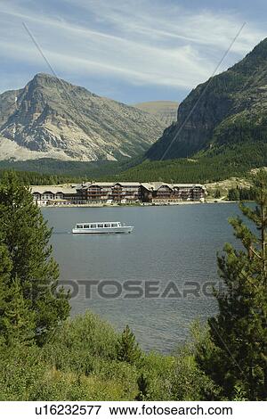 Stock Photo -  Glacier National Park, MT, Montana, Rocky Mountains, Many Glacier Region, Many Glacier Hotel, Swiftcurrent Lake. Fotosearch