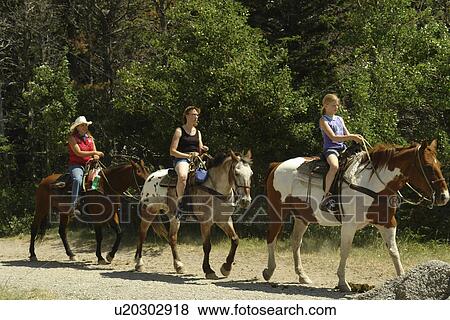 Glacier National Park, MT, Montana, Rocky Mountains, Many Glacier Region, Many Glacier Hotel, trail rides View Large Photo Image Stock Photo - Glacier National Park, MT, Montana, Rocky Mountains, Many Glacier Region, Many Glacier Hotel, trail rides. Fotosearch