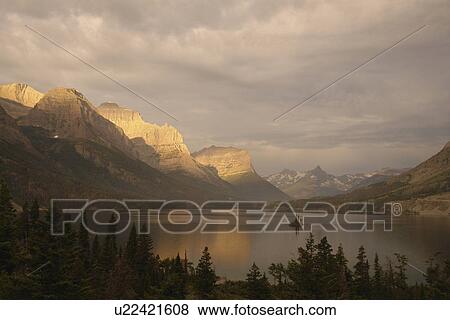Glacier National Park, MT, Montana, Rocky Mountains, Going to the Sun Road, St. Mary Lake, sunrise View Large Photo Image Stock Photo - Glacier National Park, MT, Montana, Rocky Mountains, Going to the Sun Road, St. Mary Lake, sunrise. Fotosearch